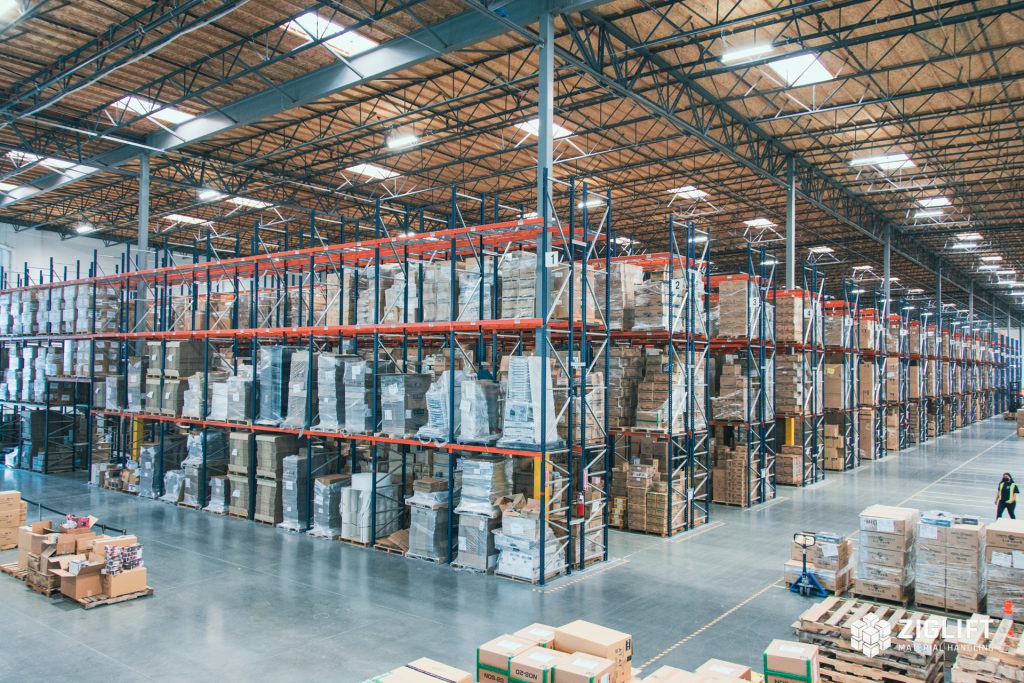 Rows of industrial pallet racks loaded with pallets in a Buffalo warehouse